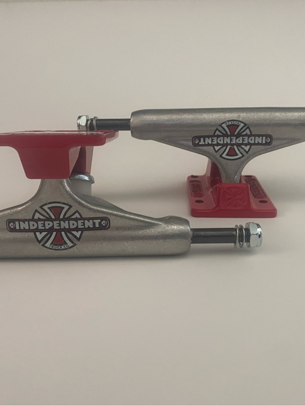 Red & Silver Skateboard Trucks -